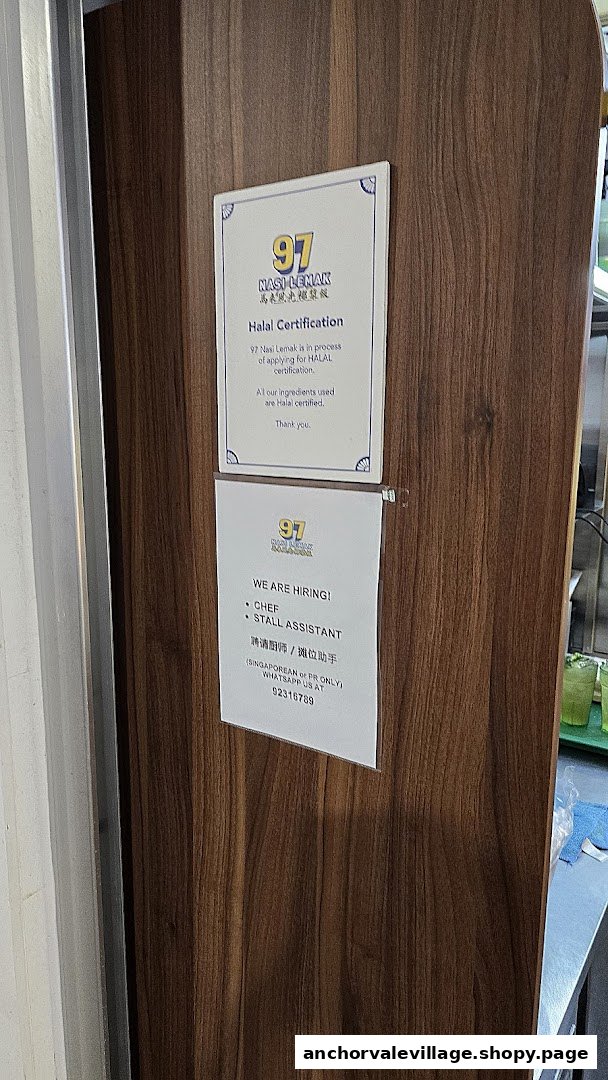 Notices for Halal certification status and job openings displayed at 97 Nasi Lemak.