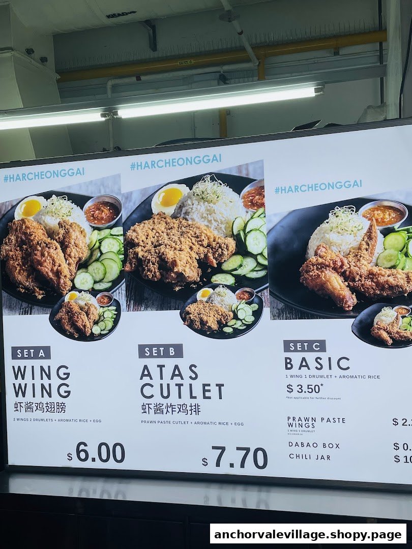 A digital menu board showcasing various chicken wing and cutlet sets with prices and descriptions.