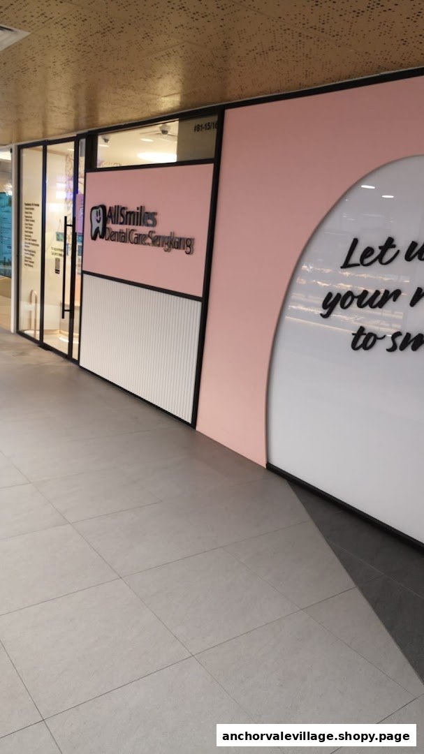The modern pink and white facade of AllSmiles Dental Care Sengkang clinic entrance.