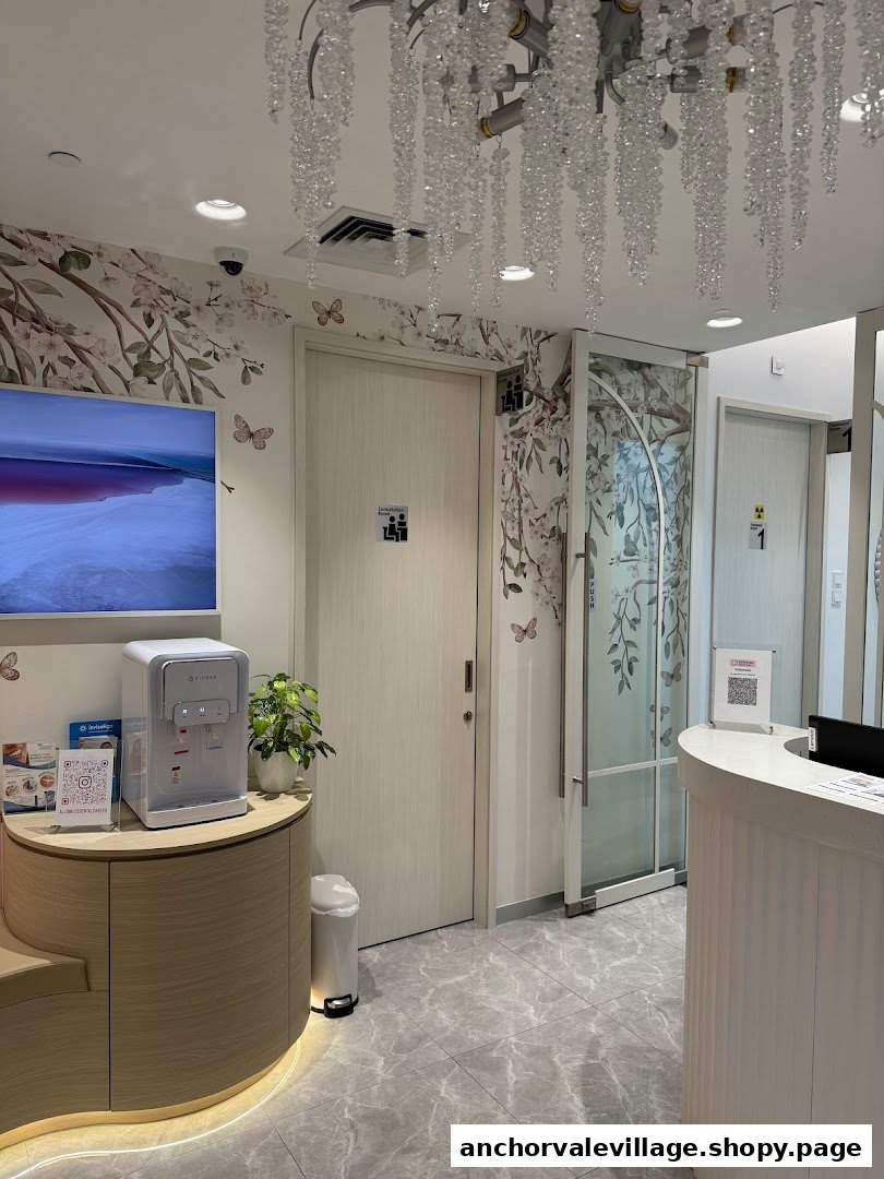 A modern and serene dental clinic interior featuring a reception area, water dispenser, and nature-themed decor.