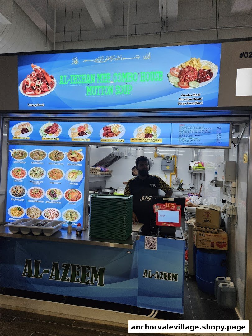 A vibrant hawker stall, Al-Azeem, featuring extensive menu boards and a staff member preparing food.