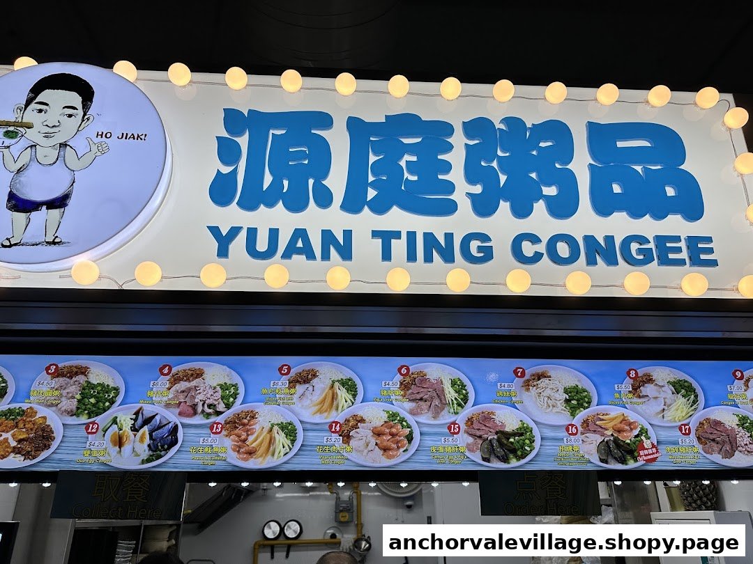 A brightly lit signboard and visual menu display for Yuan Ting Congee, showcasing various congee dishes with prices.