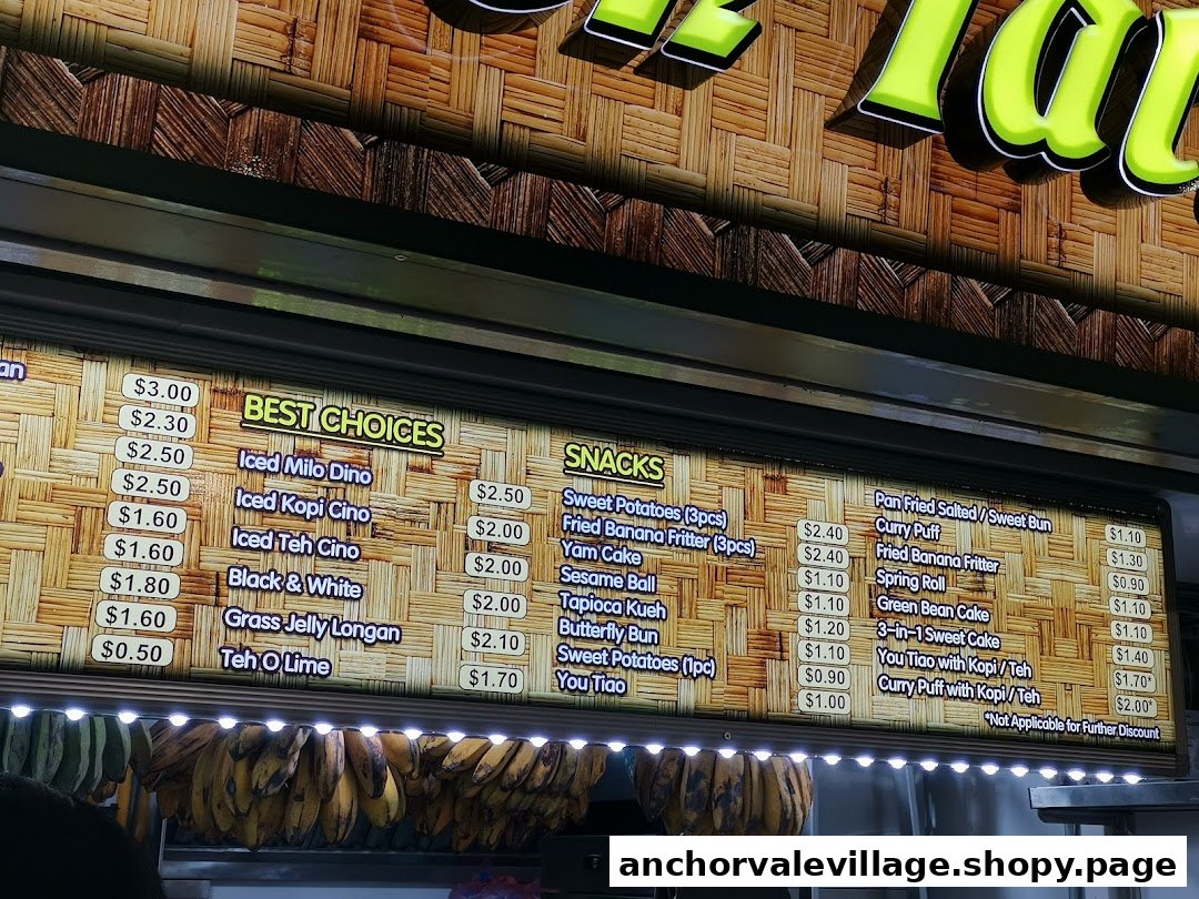 A brightly lit menu board displaying a variety of drinks and traditional snacks with prices.