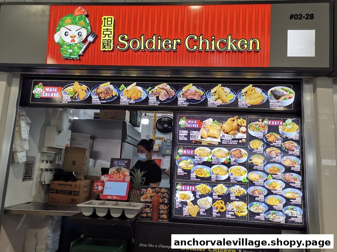 A hawker stall named Soldier Chicken with a staff member and large menu displays.