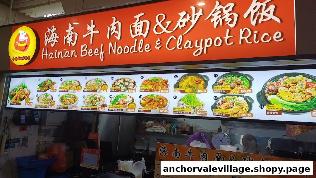 A vibrant menu board showcasing various Hainan beef noodles and claypot rice dishes with prices and images.