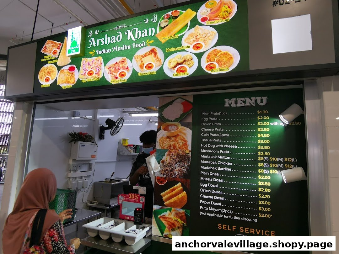 A vibrant menu board for Arshad Khan Indian Muslim Food, showcasing a variety of prata, murtabak, and dosai dishes.