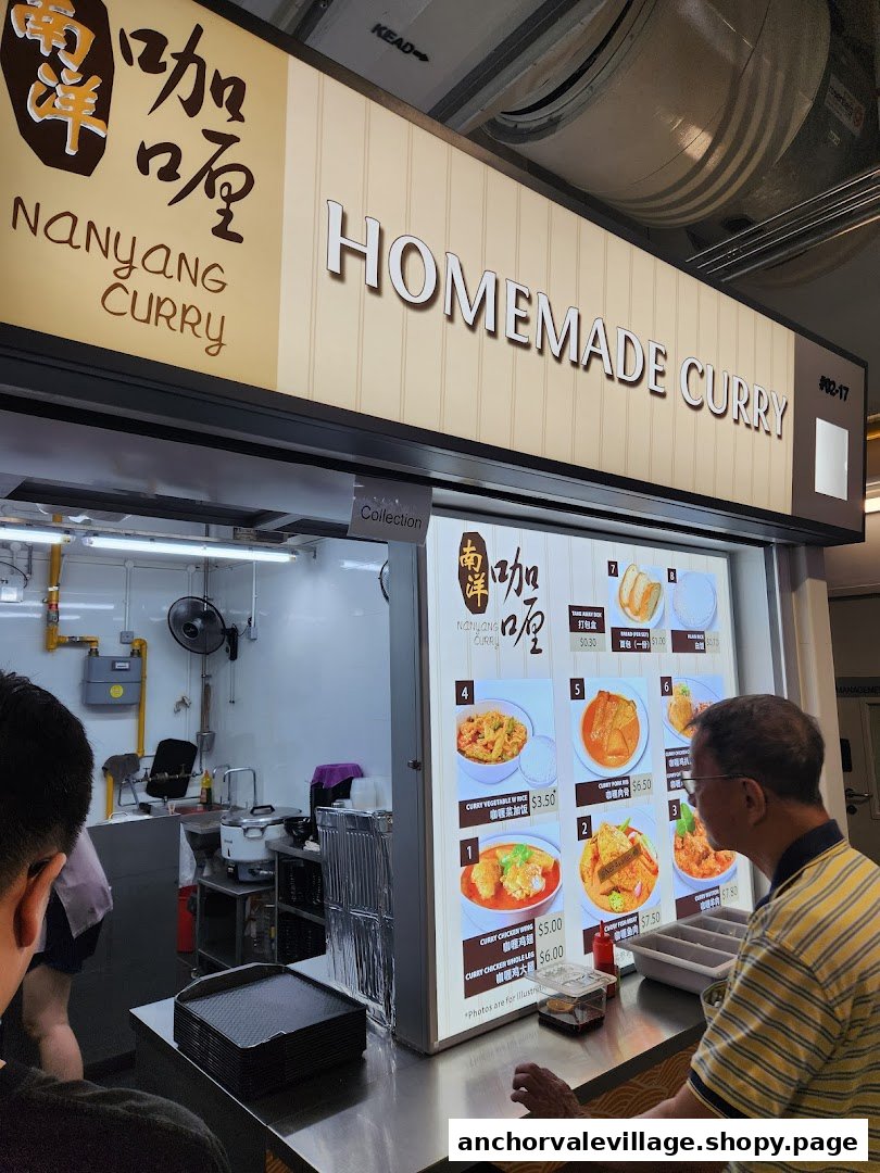 A customer views the menu board at Nanyang Curry, featuring various homemade curry dishes.