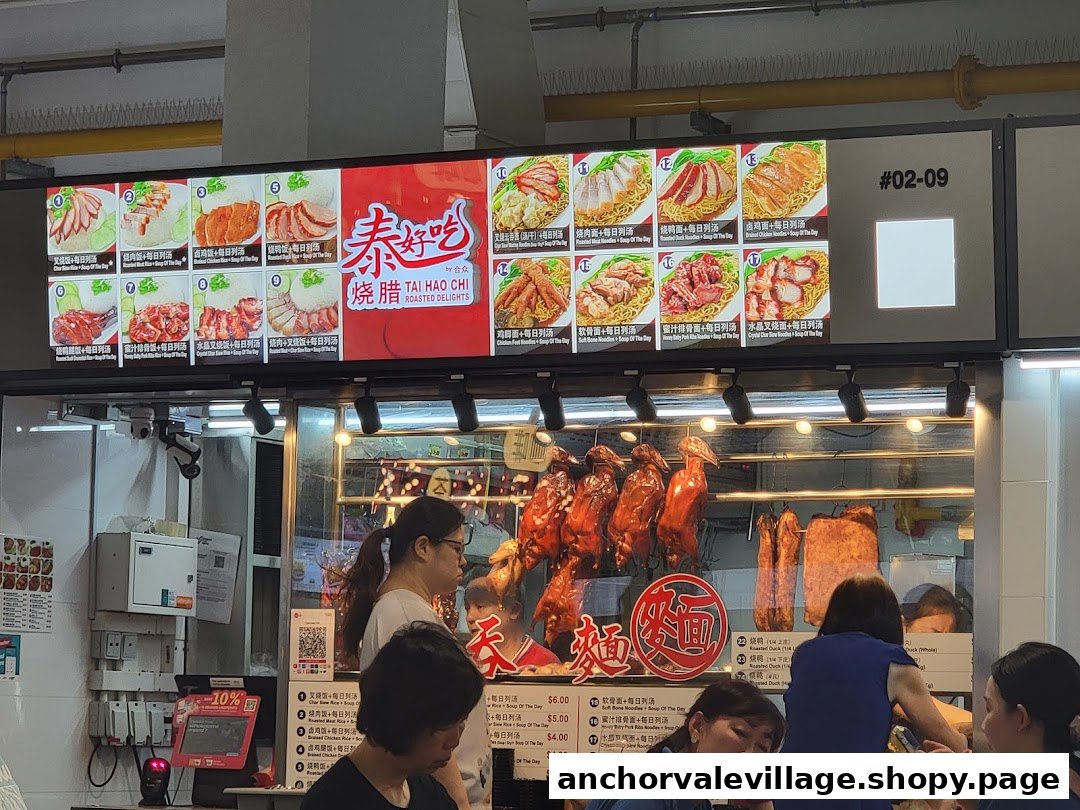 A vibrant menu board displaying various roasted meat dishes at Tai Hao Chi hawker stall.