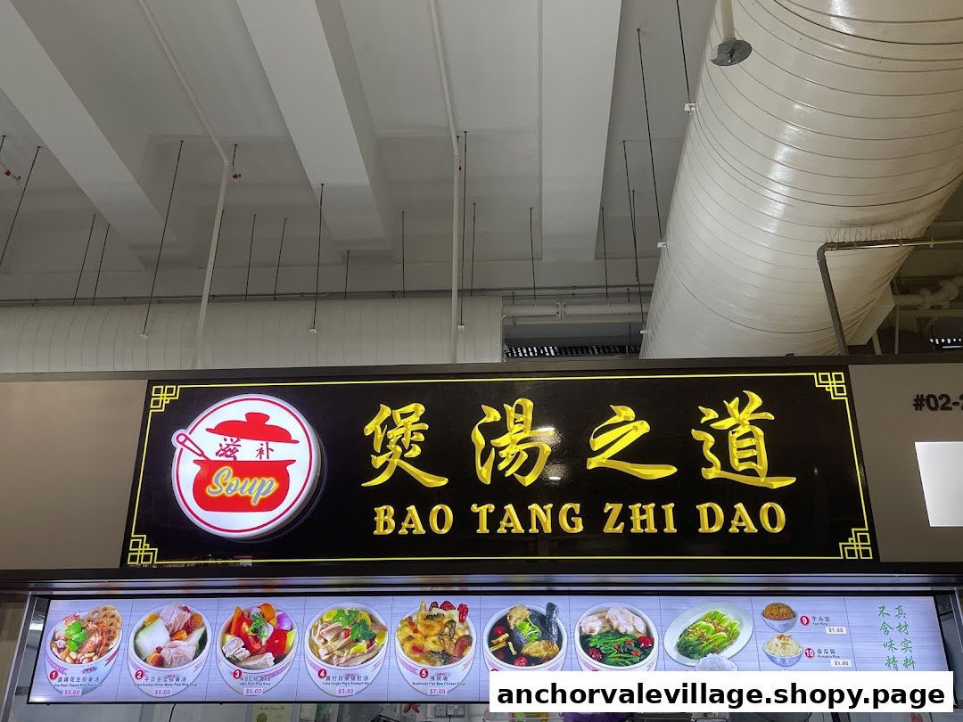 A vibrant display board showcasing various traditional Chinese soups and side dishes with prices.