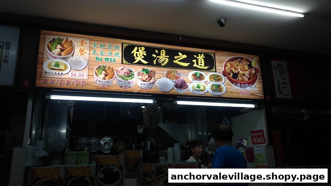 An illuminated menu board showcasing healthy Chinese soups and rice dishes at Bao Tang Zhi Dao.