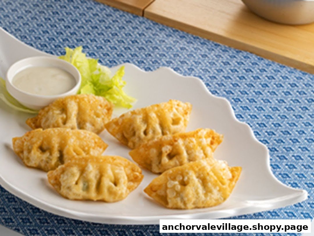 A plate of golden-fried dumplings with dipping sauce and fresh lettuce.