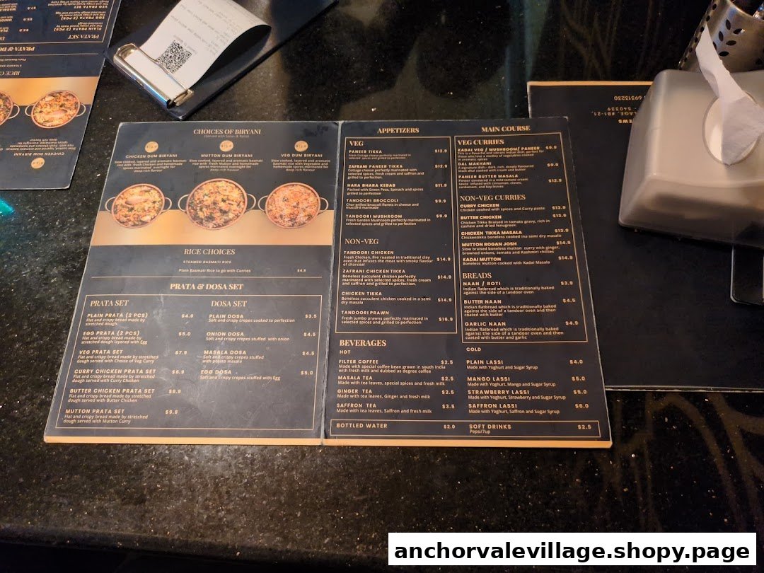 A detailed menu from Biryani Brews, showcasing a variety of Indian dishes and beverages.