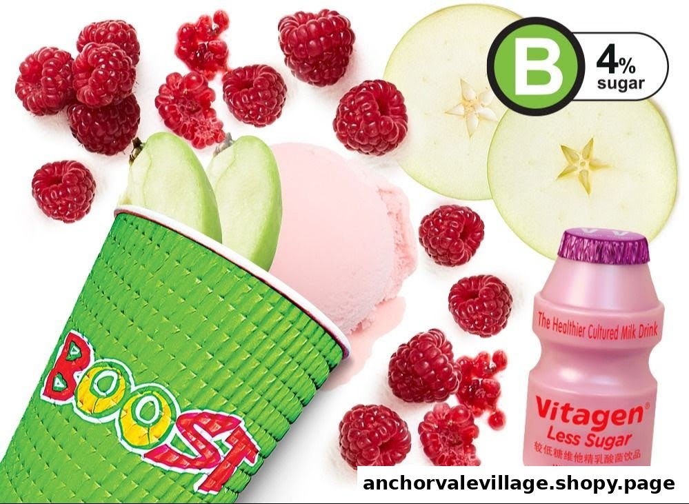 A vibrant flat lay featuring a Boost Juice cup, fresh raspberries, apple slices, and a Vitagen drink.