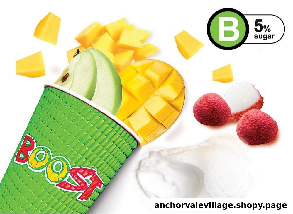 A Boost Juice cup surrounded by fresh mango, apple, lychee, and a creamy ingredient, highlighting 5% sugar.