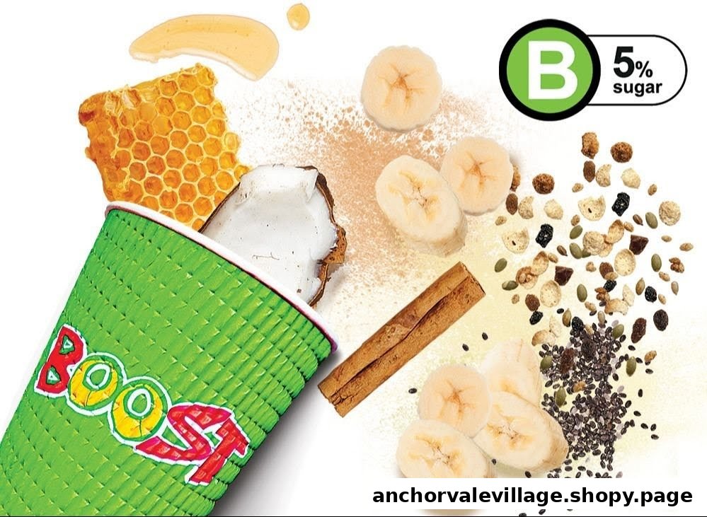 A Boost Juice cup surrounded by fresh ingredients like banana, coconut, honey, cinnamon, and seeds.