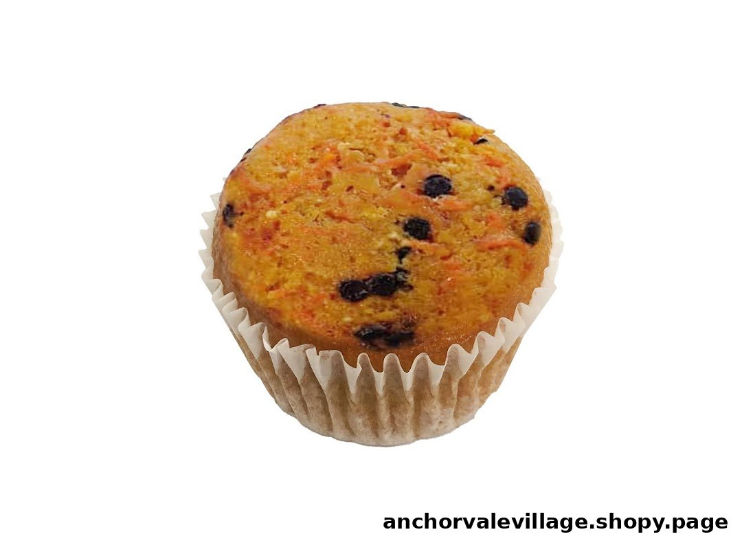 A single carrot muffin with chocolate chips in a white paper liner.