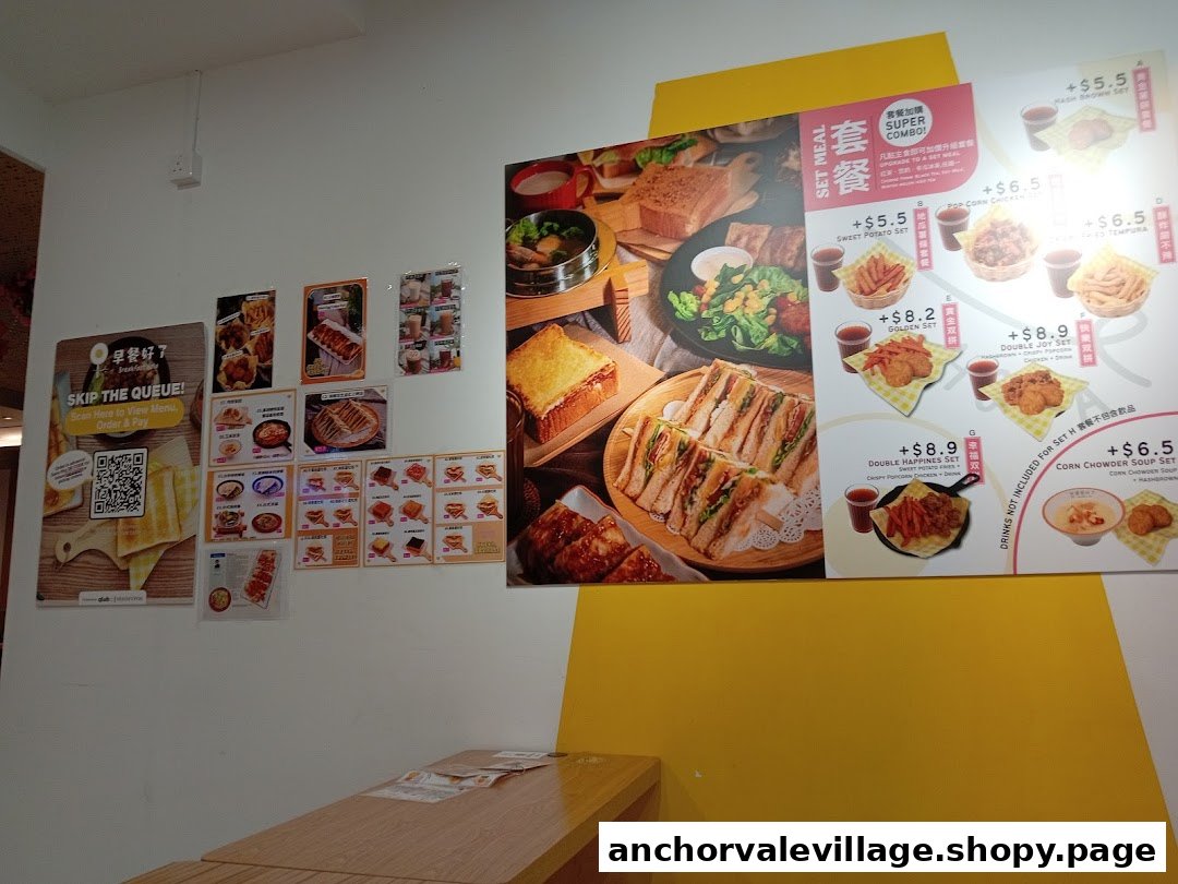 A wall display showcasing various breakfast and meal sets with prices and images.