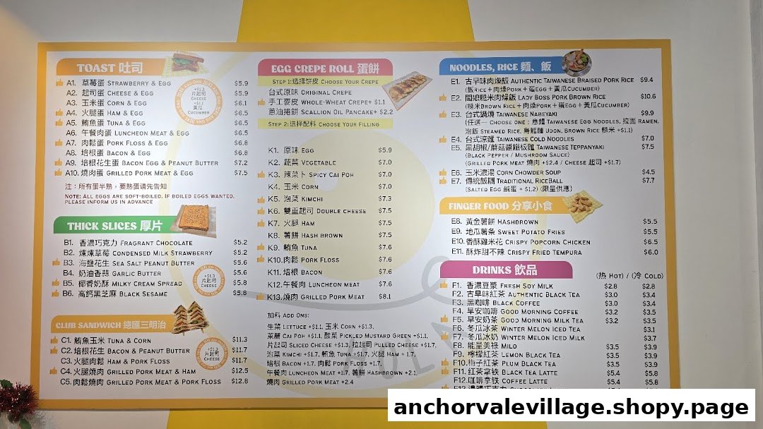A comprehensive menu board displaying a variety of breakfast and meal options, including toasts, crepes, noodles, and drinks.