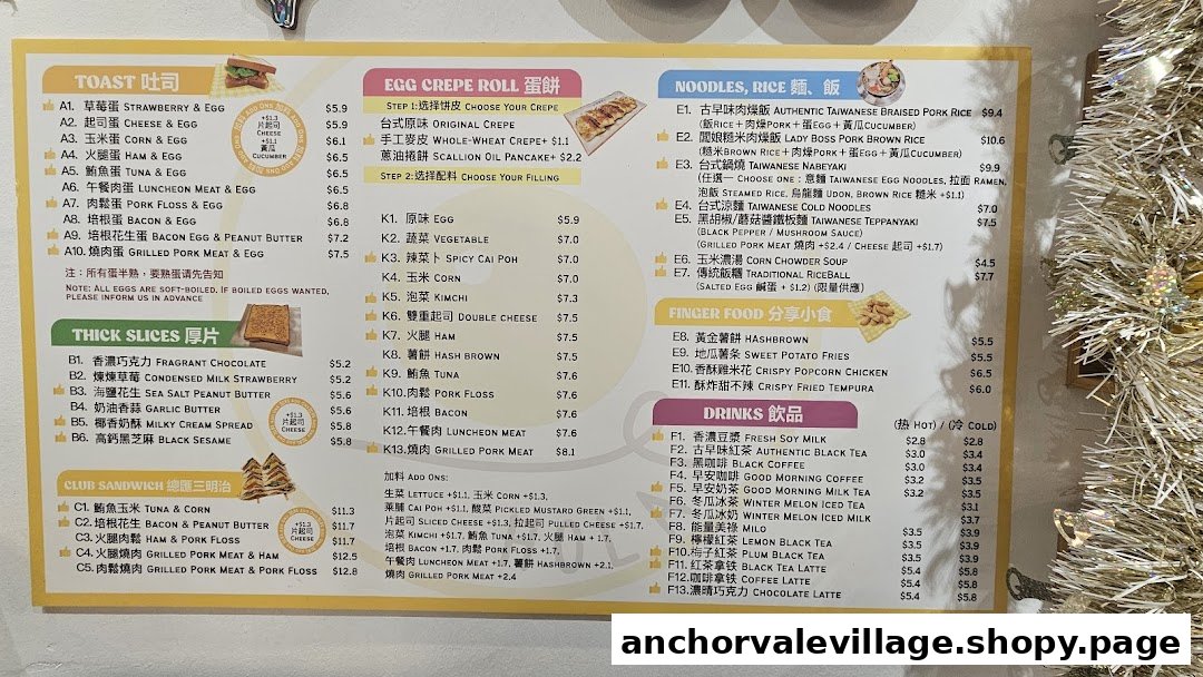 A comprehensive menu board displaying a variety of breakfast and meal options, including toasts, crepes, noodles, and drinks.