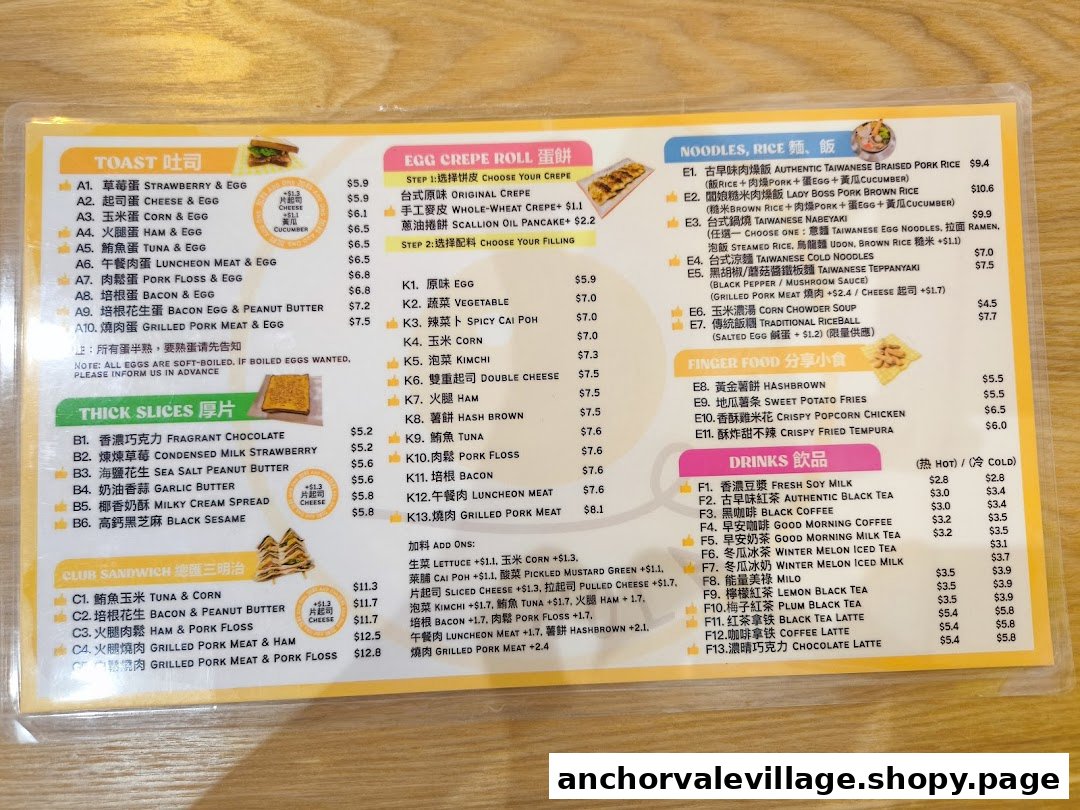 A detailed menu displaying a variety of breakfast and meal options, including toasts, crepes, noodles, and drinks.