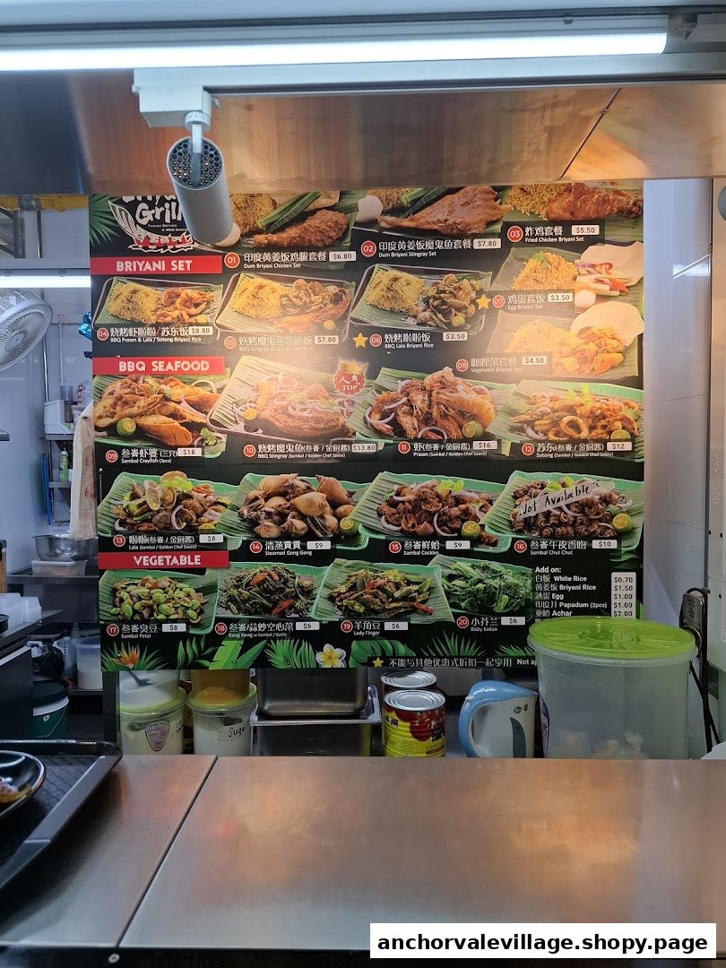 A brightly lit menu board for Briyani Grill, showcasing various biryani, seafood, and vegetable dishes.