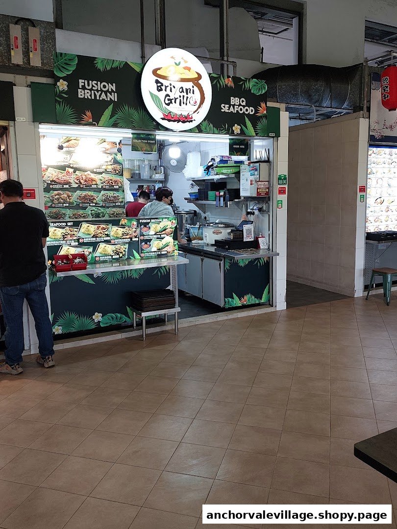 Briyani Grill food stall with signage, food displays, and staff preparing orders.
