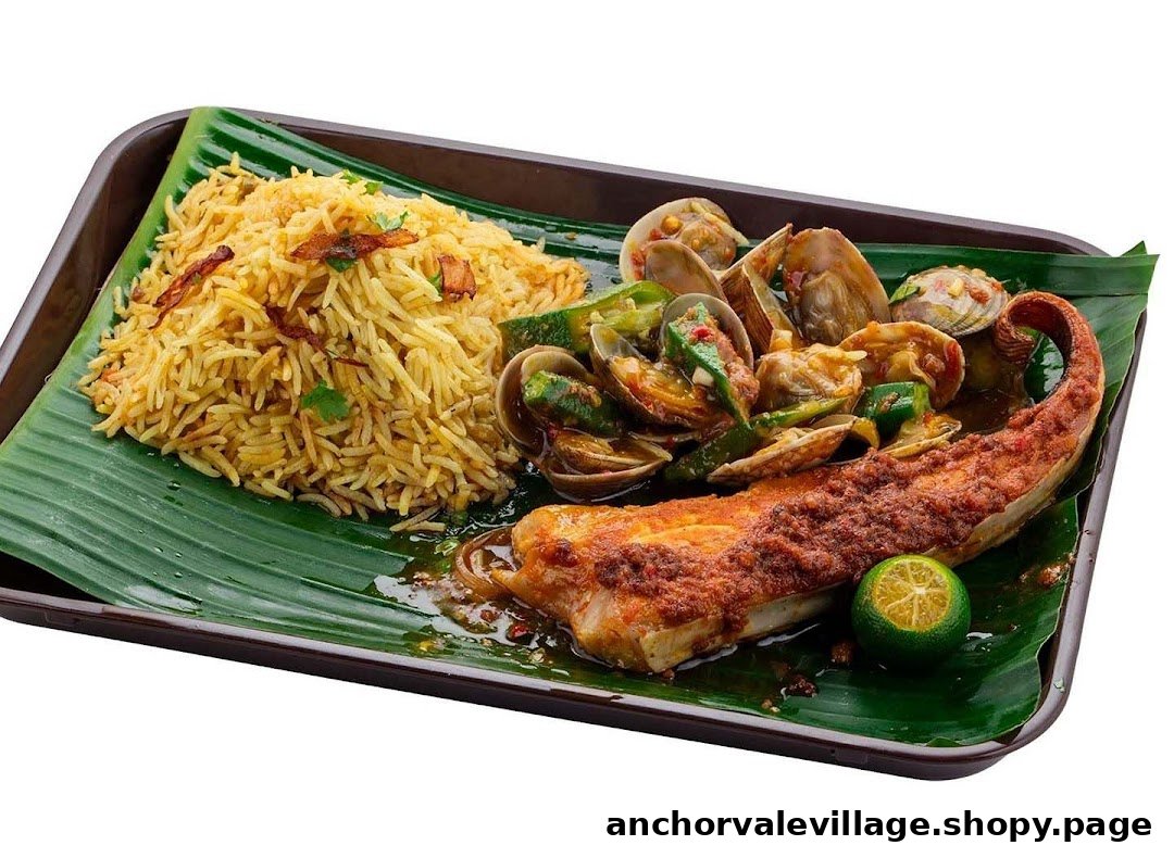A vibrant plate featuring biryani rice, spicy clams, and grilled fish on a banana leaf.