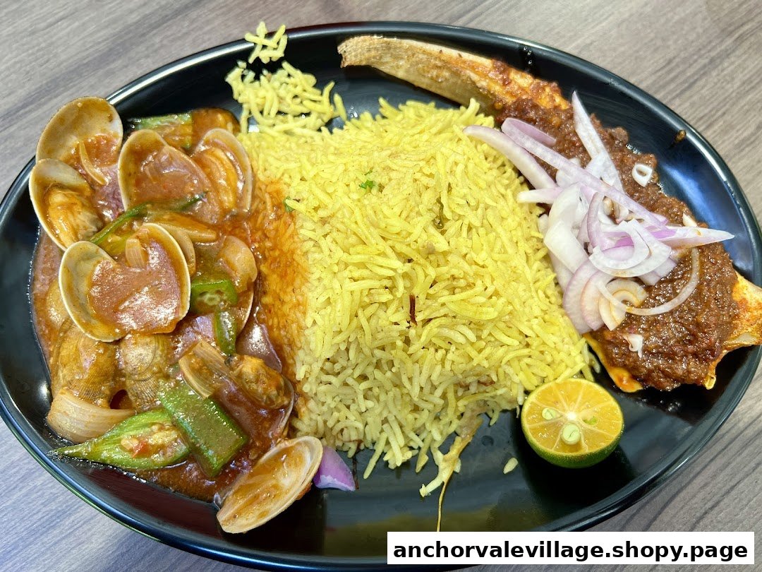 A vibrant plate featuring yellow rice, spicy clams with okra, and a fish dish with onions and lime.
