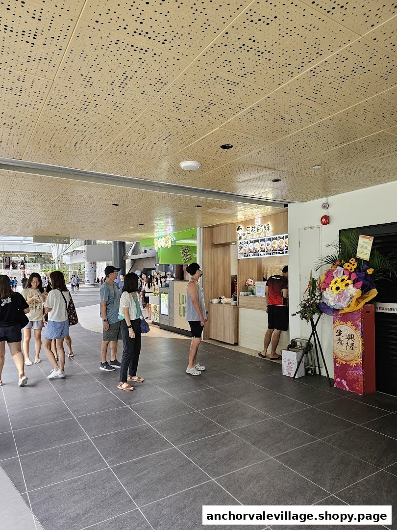 Customers queuing at the counter of Dou Hua Ah Mei, a traditional dessert shop.