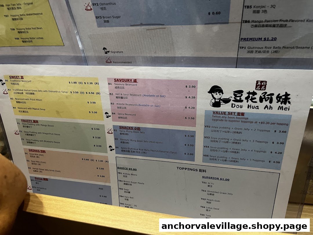 A detailed menu for Dou Hua Ah Mei, featuring various beancurd desserts, drinks, and toppings.