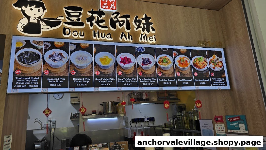 A vibrant menu board showcasing a variety of traditional and modern desserts and snacks at Dou Hua Ah Mei.