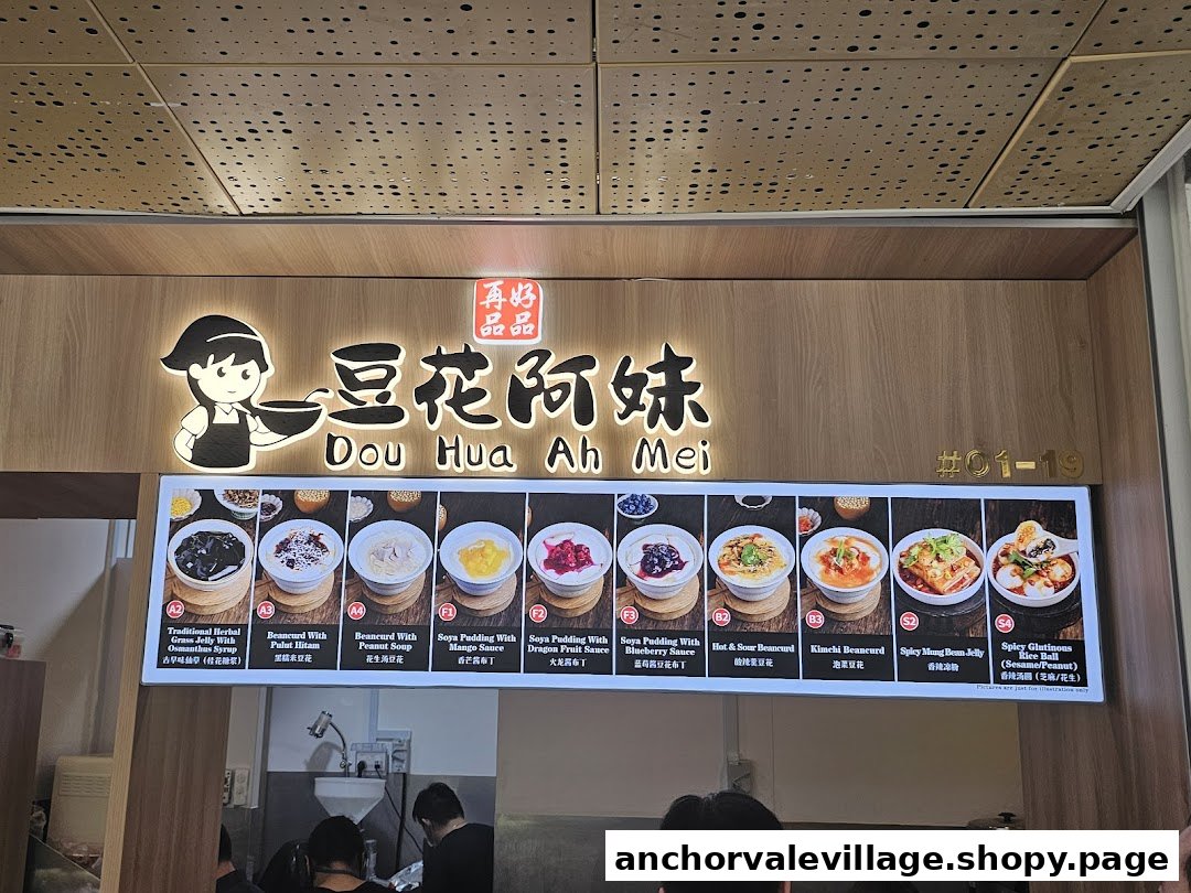 A menu board for Dou Hua Ah Mei, showcasing various beancurd and dessert options with images.