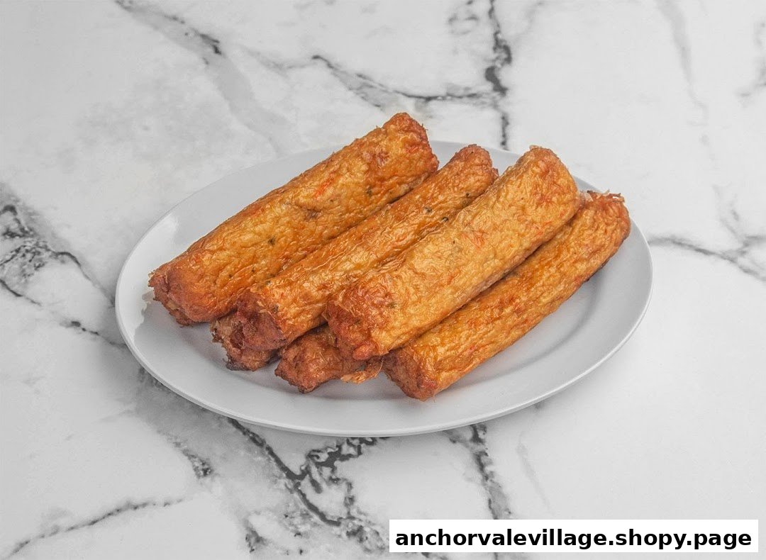 A plate of golden-brown fried fish cakes or rolls, likely a popular side dish.