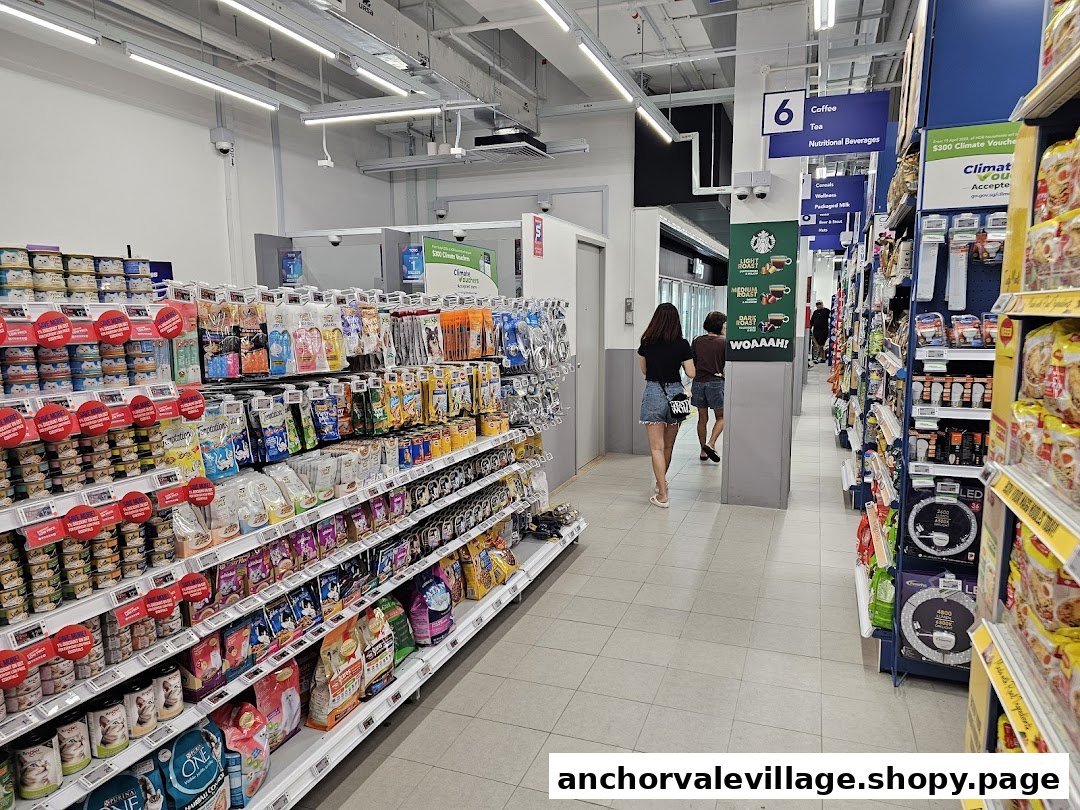 An interior view of FairPrice supermarket aisles, showcasing diverse products from pet food to beverages.