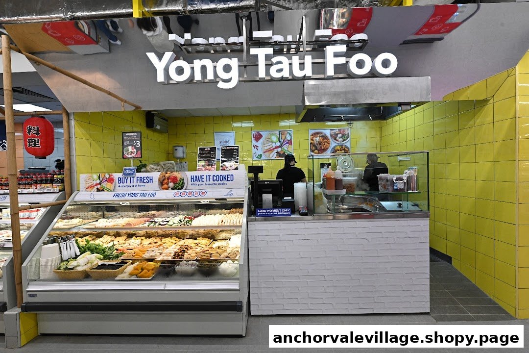 A vibrant Yong Tau Foo stall inside a supermarket, offering fresh ingredients for customisable meals.