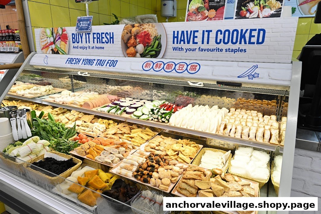 A vibrant display of fresh Yong Tau Foo ingredients in a supermarket chiller.