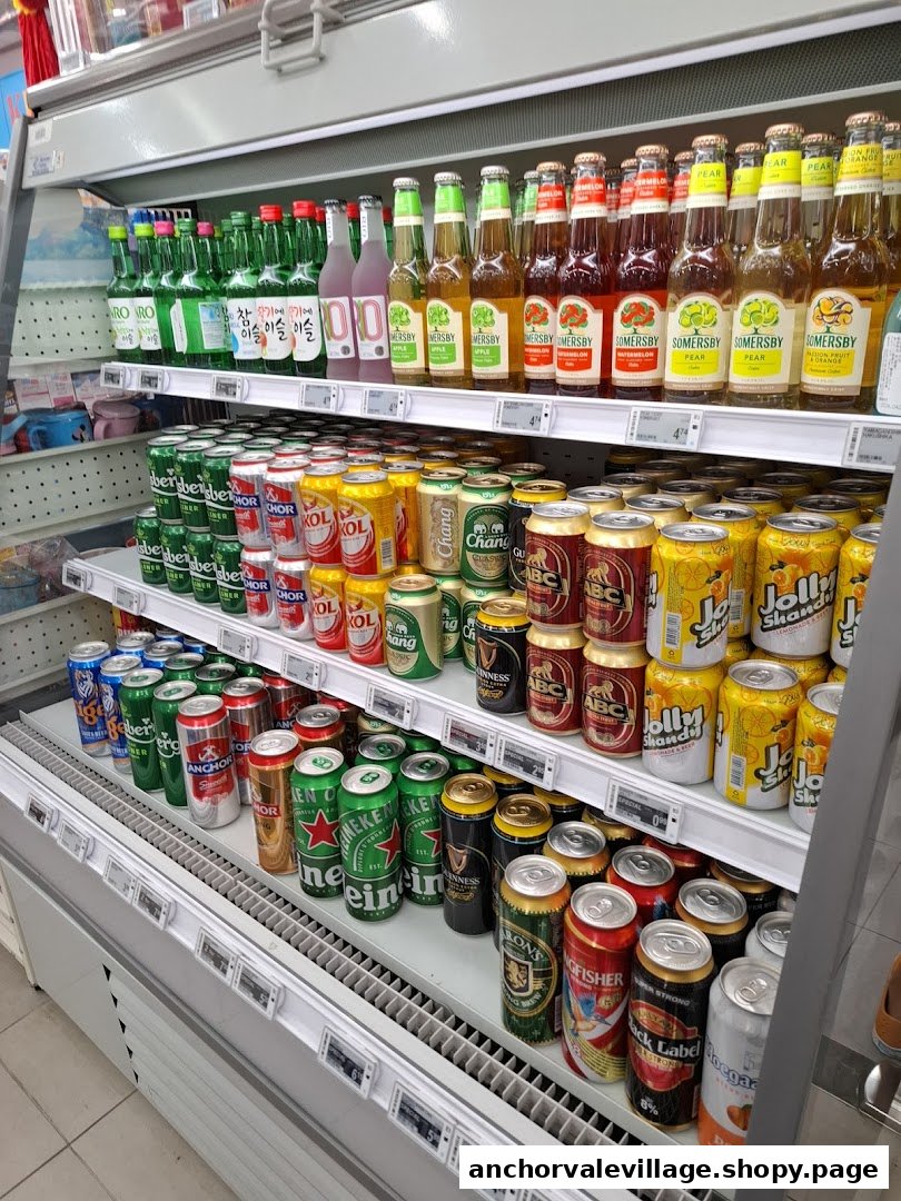 A refrigerated display of various alcoholic and non-alcoholic beverages, including beers, ciders, and soju.