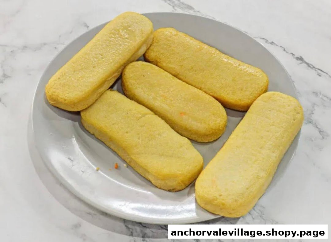 A plate of golden-brown, oblong fried items, likely fish cakes or similar rojak ingredients.