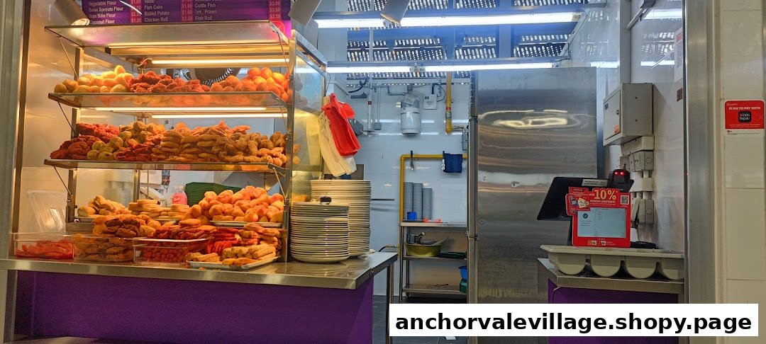 A vibrant display of fried snacks and a partial menu board at a food stall.