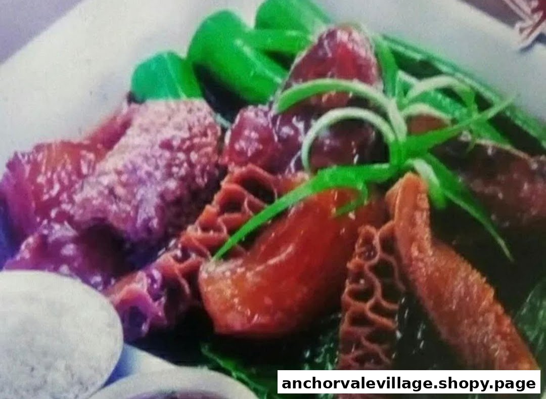A close-up of a savory dish featuring beef tripe, other meat cuts, and green vegetables, garnished with spring onions.