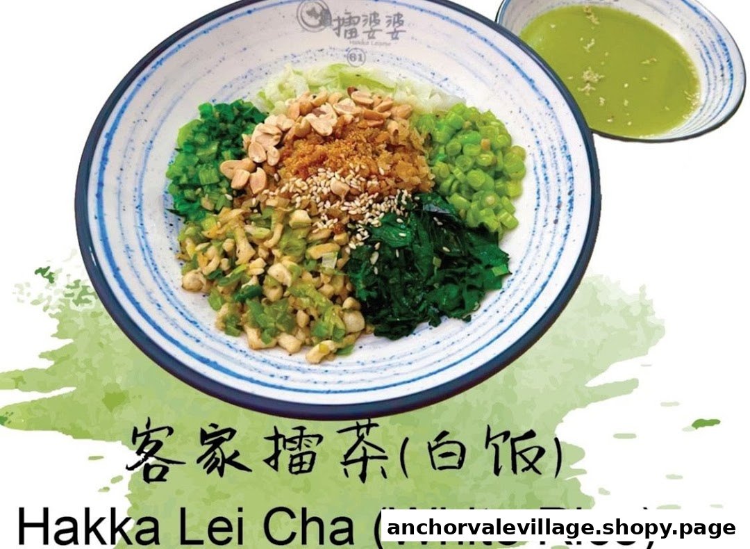 A vibrant bowl of Hakka Lei Cha (Thunder Tea Rice) with various toppings and a side of green tea soup.