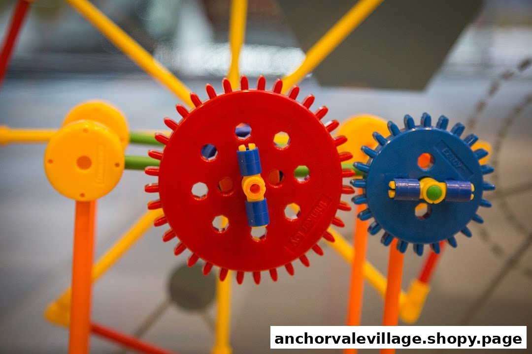 Close-up of colorful interlocking gears and construction toy parts, showcasing hands-on STEM learning.