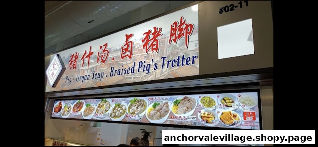 A brightly lit hawker stall front showcasing its signature Pig's Organ Soup and Braised Pig's Trotter dishes with prices.