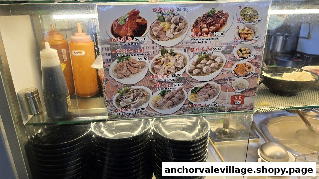 A detailed menu board displaying various traditional Chinese dishes, including pig organ soups and braised trotters, with prices.