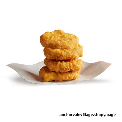 A stack of four golden-brown chicken nuggets on a white background.