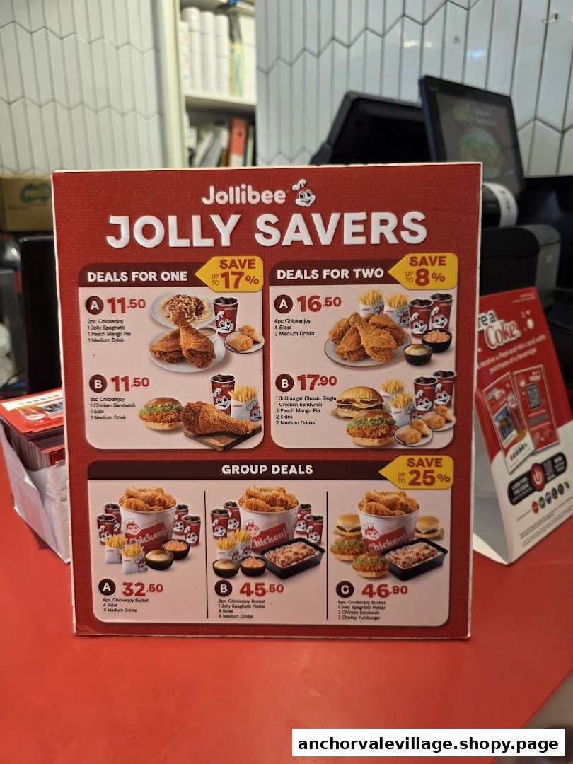 A Jollibee menu board displaying various 'Jolly Savers' meal deals for individuals and groups.
