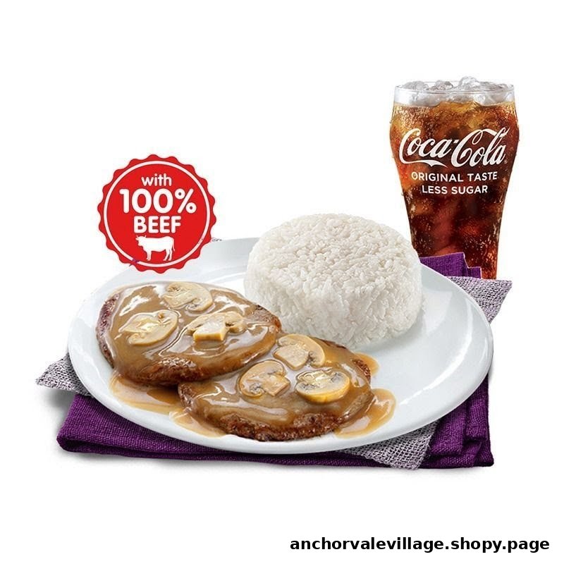 A plate of Jollibee's burger steak with mushrooms, rice, and a Coca-Cola drink.