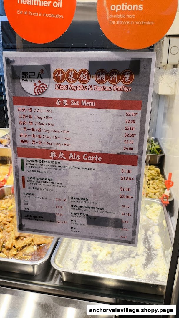 A detailed menu board for Kakhi Nang, showcasing set meals and ala carte options for mixed veg rice and Teochew porridge.