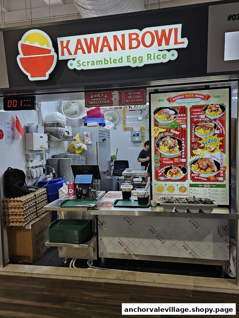 The vibrant storefront of Kawan Bowl, specializing in scrambled egg rice, with its menu display.