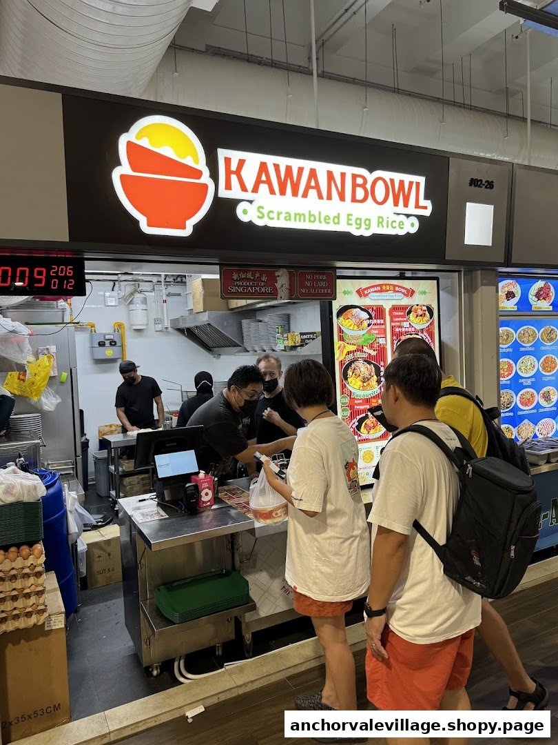 A bustling Kawan Bowl food stall serving scrambled egg rice, with customers ordering at the counter.